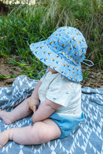 Load image into Gallery viewer, Acorn - Sail The Bay Wide Brim Infant Hat - Blue/Tan/Gold
