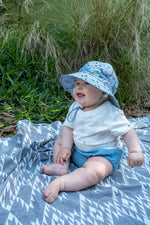 Load image into Gallery viewer, Acorn - Sail The Bay Wide Brim Infant Hat - Blue/Tan/Gold
