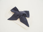 Load image into Gallery viewer, Snuggle Hunny Kids - Navy Linen Bow Pre-Tied Headband Wrap

