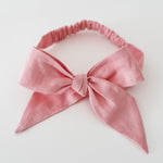 Load image into Gallery viewer, Snuggle Hunny Kids - Baby Pink Linen Bow Pre Tied Headband Wrap
