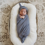 Load image into Gallery viewer, Snuggle Hunny Kids - Indigo Baby Jersey Wrap &amp; Beanie Set
