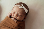 Load image into Gallery viewer, Snuggle Hunny Kids - Bronze Baby Jersey Wrap &amp; Beanie Set
